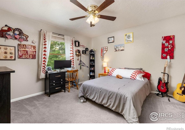 806 51st Ave, Greeley, CO 80634 - bedroom featuring carpet and a ceiling fan