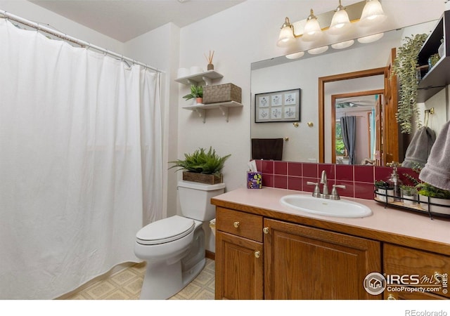 806 51st Ave, Greeley, CO 80634 - full bathroom with vanity, decorative backsplash, and a shower with shower curtain