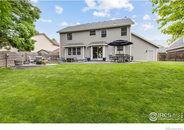 806 51st Ave, Greeley, CO 80634 - rear view of property with a patio and a fenced backyard