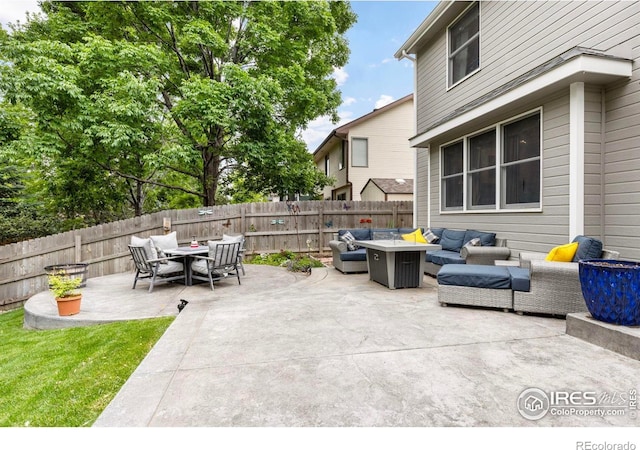 806 51st Ave, Greeley, CO 80634 - view of patio featuring an outdoor living space with a fire pit
