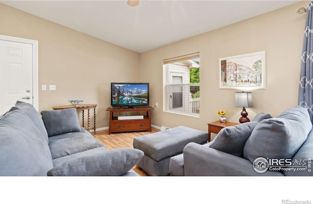 856 Sunchase Dr, Fort Collins, CO 80524 - living room featuring wood finished floors and baseboards