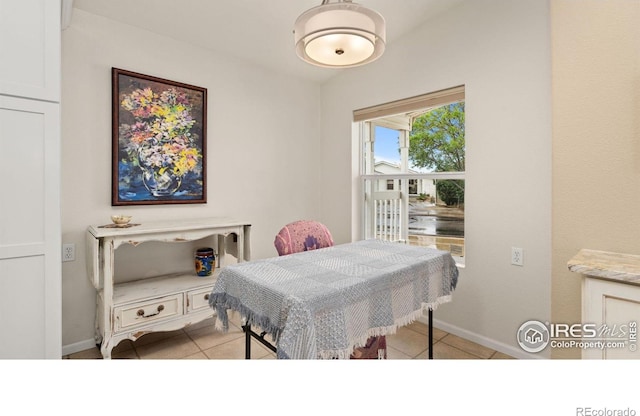 856 Sunchase Dr, Fort Collins, CO 80524 - dining room featuring light tile patterned floors and baseboards