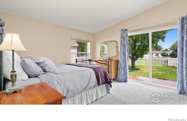 856 Sunchase Dr, Fort Collins, CO 80524 - carpeted bedroom with lofted ceiling and access to outside