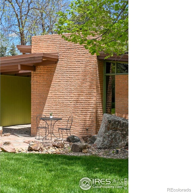 5450 Mohawk Rd, Littleton, CO 80123 - exterior view of brick siding