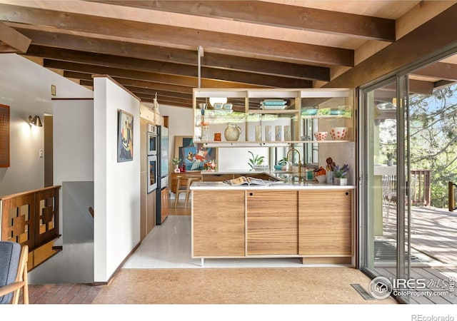 5450 Mohawk Rd, Littleton, CO 80123 - bar area featuring beam ceiling, a sink, and stainless steel double oven