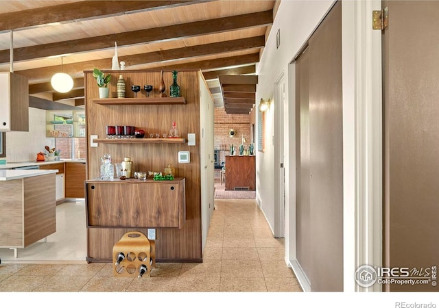 5450 Mohawk Rd, Littleton, CO 80123 - bar with wooden ceiling, backsplash, pendant lighting, and baseboards