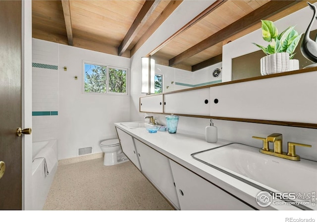 5450 Mohawk Rd, Littleton, CO 80123 - bathroom with wooden ceiling with exposed beams, double vanity, toilet, baseboards, and shower / washtub combination