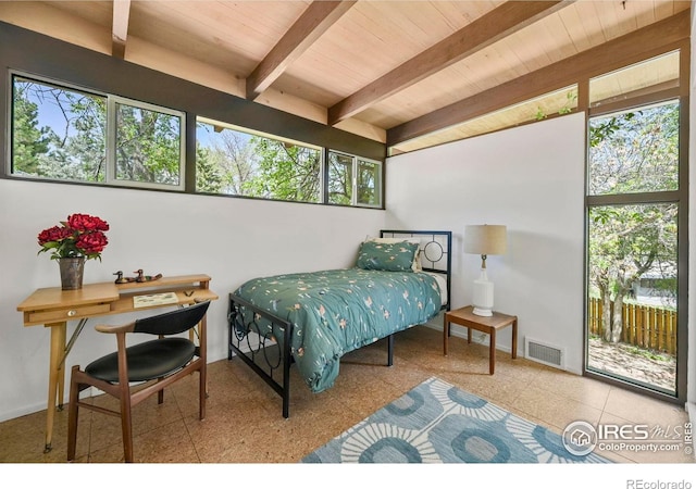 5450 Mohawk Rd, Littleton, CO 80123 - bedroom with wood ceiling with exposed beams and access to outside