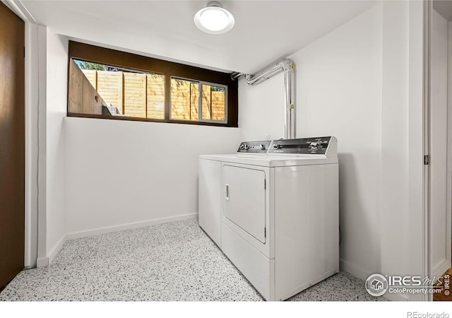 5450 Mohawk Rd, Littleton, CO 80123 - laundry room featuring independent washer and dryer and baseboards