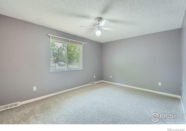 701 Elm St, Windsor, CO 80550 - spare room featuring carpet, a ceiling fan, a textured ceiling, and baseboards