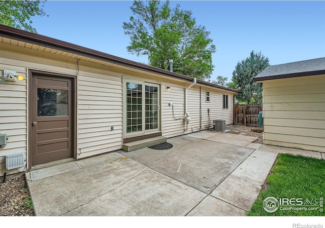 701 Elm St, Windsor, CO 80550 - back of house featuring a patio and central AC unit
