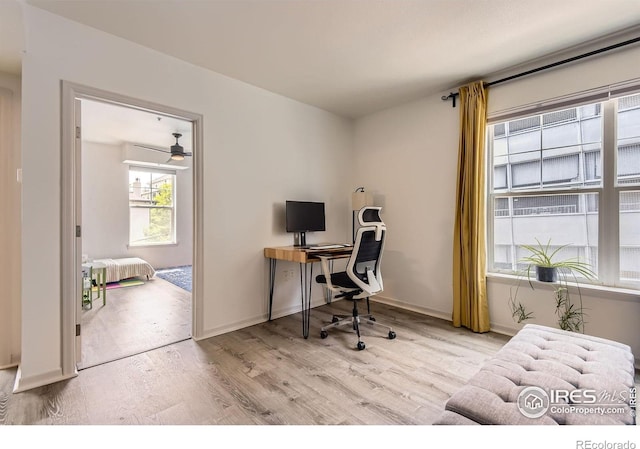 1623 Saint Paul St Unit 310, Denver, CO 80206 - office area featuring wood finished floors and baseboards