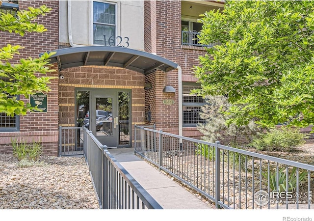 1623 Saint Paul St Unit 310, Denver, CO 80206 - property entrance with brick siding
