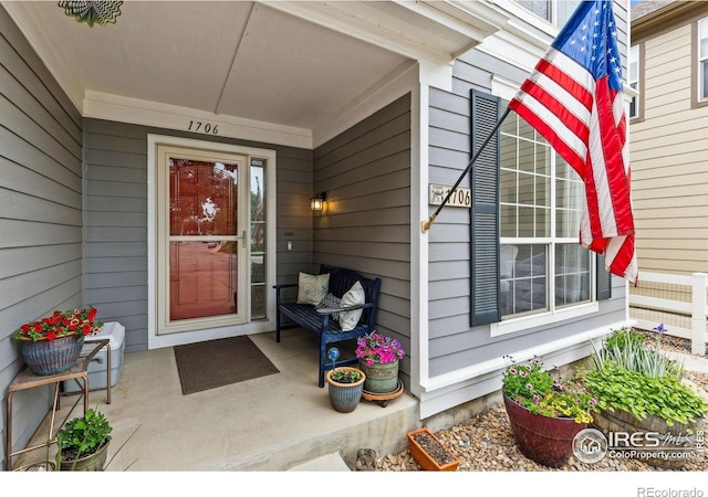 1706 Naples Ln, Longmont, CO 80503 - doorway to property with covered porch