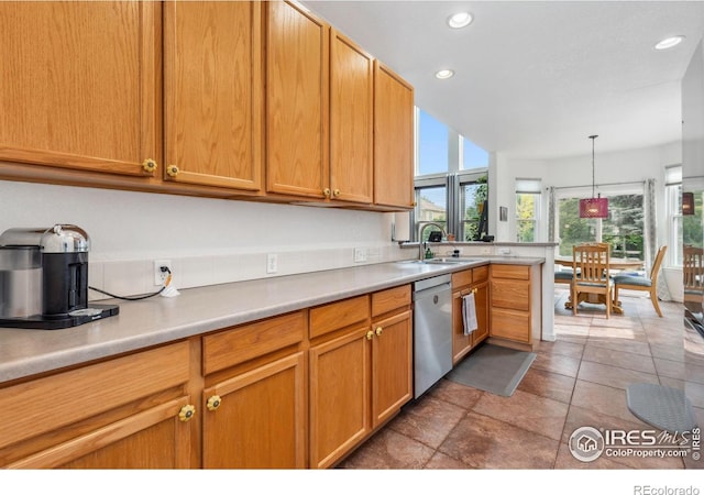 1706 Naples Ln, Longmont, CO 80503 - kitchen with dishwasher, a sink, recessed lighting, light countertops, and hanging light fixtures