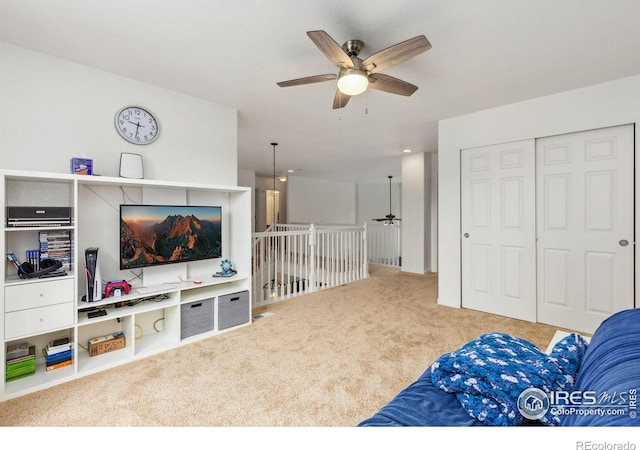 1706 Naples Ln, Longmont, CO 80503 - living area with ceiling fan and carpet