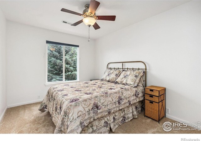 1706 Naples Ln, Longmont, CO 80503 - bedroom featuring carpet floors, baseboards, and a ceiling fan