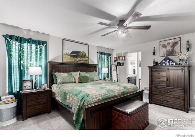 10 N Quantock St, Aurora, CO 80018 - bedroom featuring light carpet, a ceiling fan, and connected bathroom