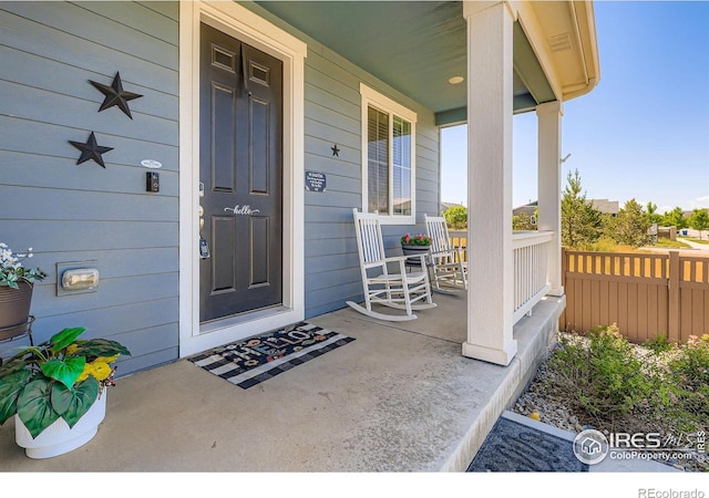 10 N Quantock St, Aurora, CO 80018 - entrance to property with a porch