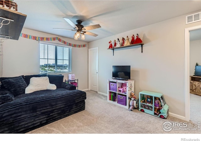 10 N Quantock St, Aurora, CO 80018 - living area featuring carpet flooring and a ceiling fan