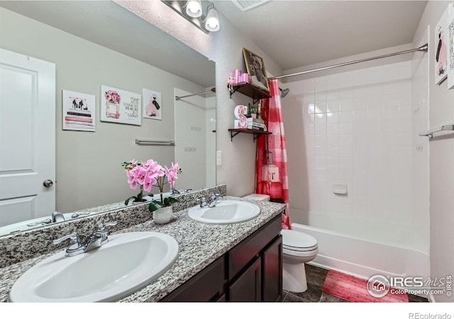 10 N Quantock St, Aurora, CO 80018 - bathroom featuring double vanity and shower / bath combination
