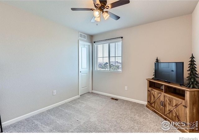 10 N Quantock St, Aurora, CO 80018 - carpeted empty room featuring ceiling fan and baseboards