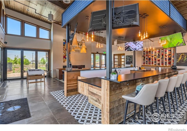 10 N Quantock St, Aurora, CO 80018 - community bar area with a high ceiling and wooden ceiling