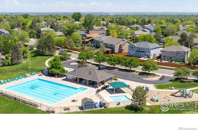 13560 Detroit St, Thornton, CO 80241 - aerial perspective of suburban area with a pool area