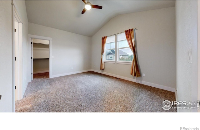2107 Blackbird Dr, Fort Collins, CO 80525 - unfurnished bedroom featuring lofted ceiling, carpet floors, a spacious closet, and a ceiling fan