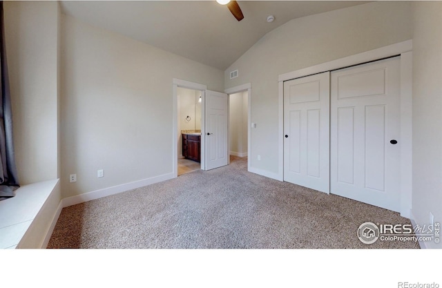 2107 Blackbird Dr, Fort Collins, CO 80525 - unfurnished bedroom featuring vaulted ceiling, light carpet, a closet, connected bathroom, and a ceiling fan