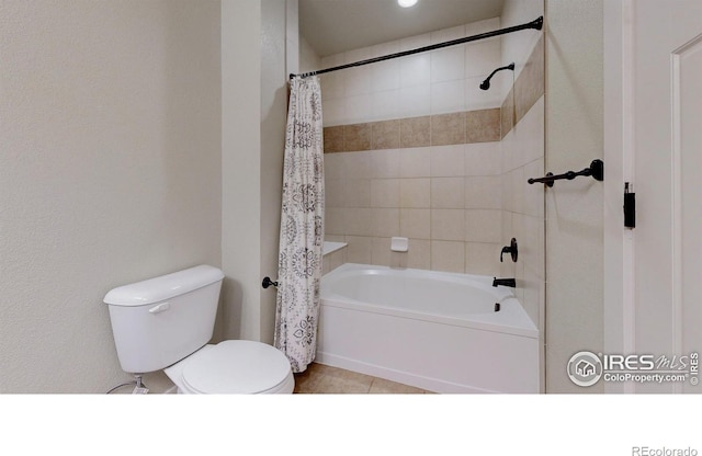 2107 Blackbird Dr, Fort Collins, CO 80525 - bathroom with shower / tub combo with curtain and tile patterned flooring