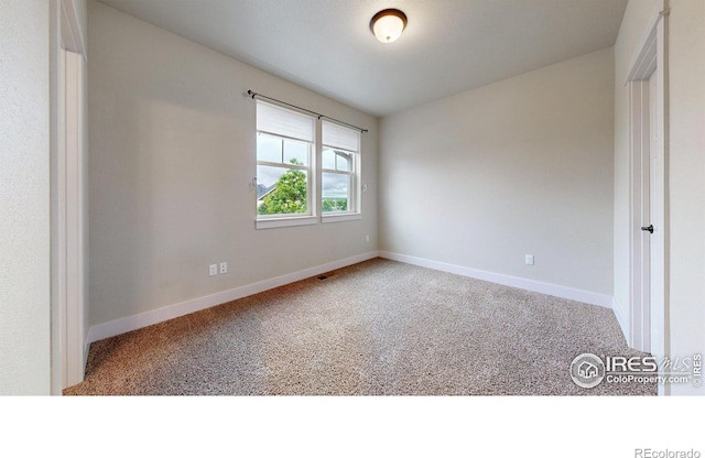 2107 Blackbird Dr, Fort Collins, CO 80525 - carpeted spare room with baseboards