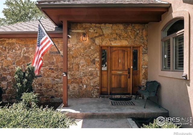 4993 Clubhouse Ct, Boulder, CO 80301 - view of exterior entry featuring stone siding and stucco siding