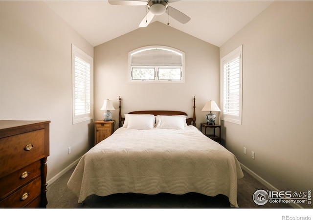 4993 Clubhouse Ct, Boulder, CO 80301 - carpeted bedroom featuring baseboards, multiple windows, vaulted ceiling, and a ceiling fan