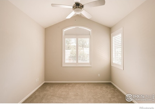 4993 Clubhouse Ct, Boulder, CO 80301 - spare room featuring ceiling fan, carpet flooring, vaulted ceiling, and baseboards