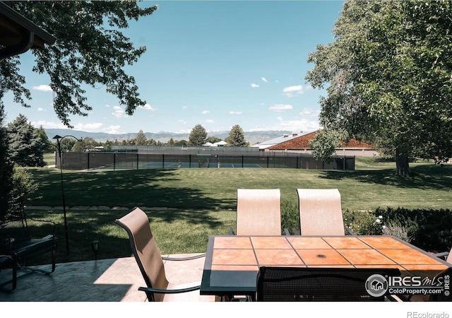 4993 Clubhouse Ct, Boulder, CO 80301 - view of yard featuring outdoor dining area, a mountain view, and a patio