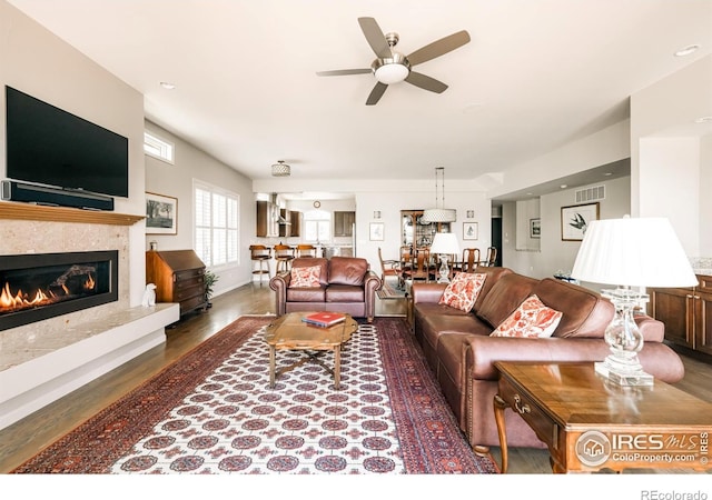 4993 Clubhouse Ct, Boulder, CO 80301 - living room with wood finished floors, a ceiling fan, and a high end fireplace