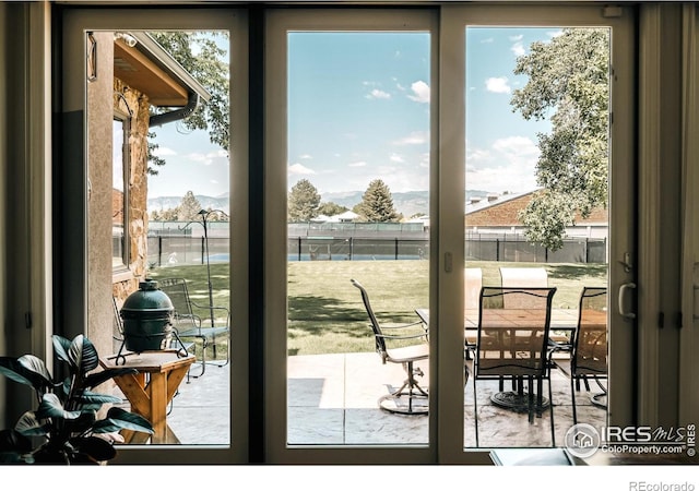 4993 Clubhouse Ct, Boulder, CO 80301 - doorway to outside featuring french doors, plenty of natural light, and a mountain view