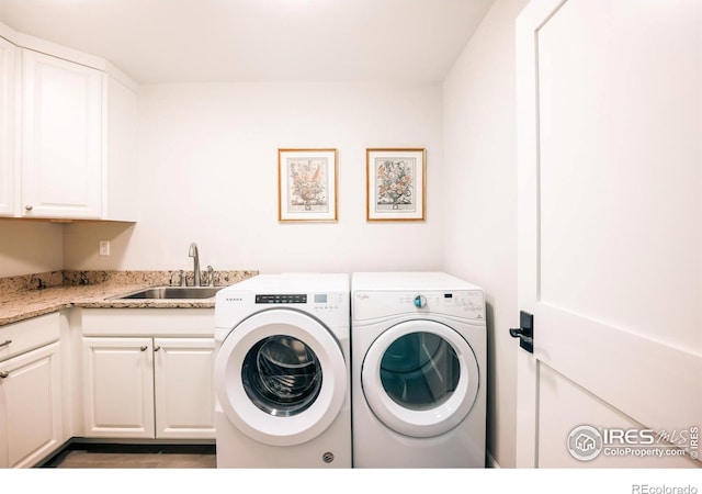 4993 Clubhouse Ct, Boulder, CO 80301 - laundry room with cabinet space and washing machine and clothes dryer