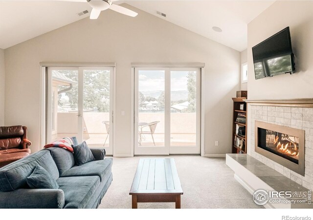 4993 Clubhouse Ct, Boulder, CO 80301 - living area featuring vaulted ceiling, carpet flooring, a fireplace, ceiling fan, and baseboards