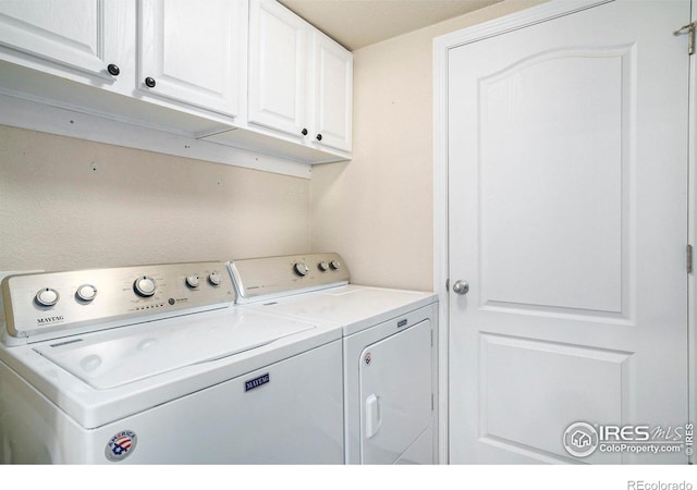 5551 29th St, Greeley, CO 80634 - washroom featuring cabinet space and washer and dryer