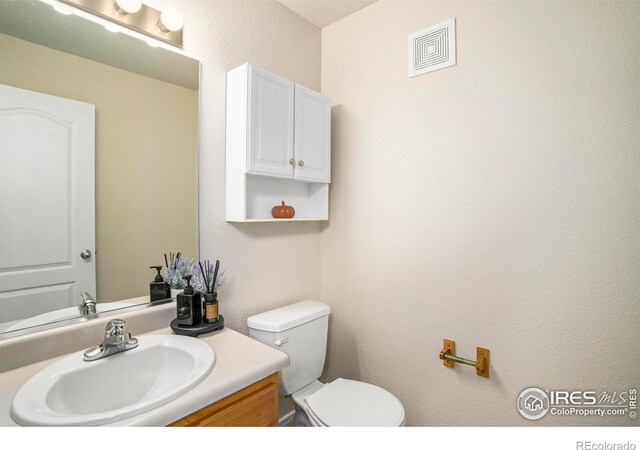 5551 29th St, Greeley, CO 80634 - bathroom with vanity and toilet