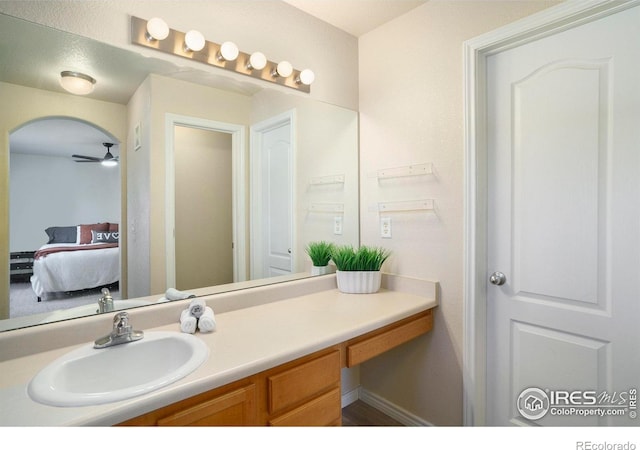 5551 29th St, Greeley, CO 80634 - bathroom with ensuite bath, vanity, and a ceiling fan