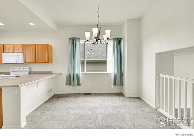1711 101st Avenue Ct, Greeley, CO 80634 - unfurnished dining area with a chandelier, recessed lighting, and baseboards