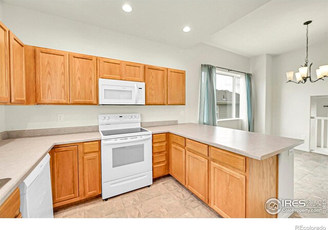 1711 101st Avenue Ct, Greeley, CO 80634 - kitchen featuring white appliances, a peninsula, a chandelier, light countertops, and recessed lighting