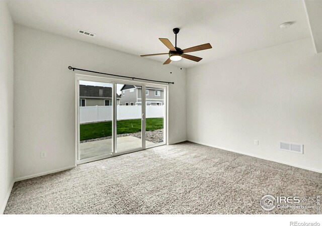 1711 101st Avenue Ct, Greeley, CO 80634 - carpeted spare room with ceiling fan, baseboards, and a smoke detector