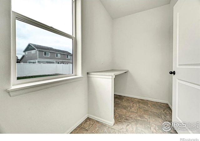 1711 101st Avenue Ct, Greeley, CO 80634 - spacious closet featuring stone finish flooring