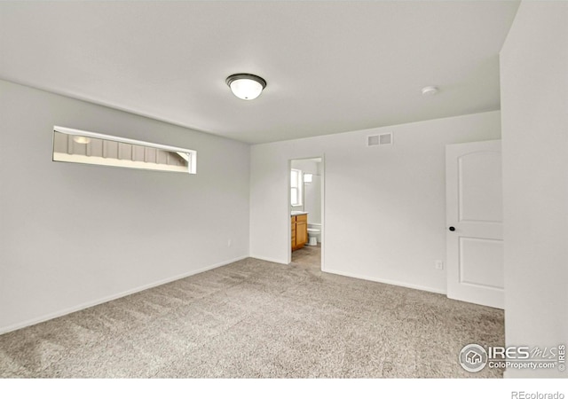 1711 101st Avenue Ct, Greeley, CO 80634 - carpeted empty room featuring baseboards and a smoke detector