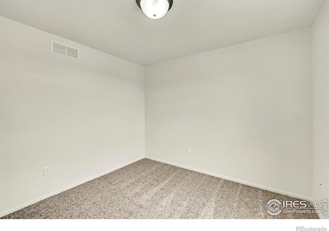 1711 101st Avenue Ct, Greeley, CO 80634 - carpeted empty room with baseboards