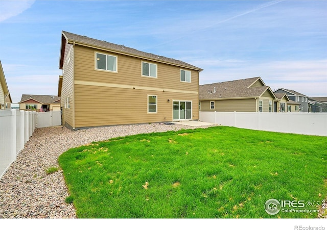 1711 101st Avenue Ct, Greeley, CO 80634 - rear view of property with a patio